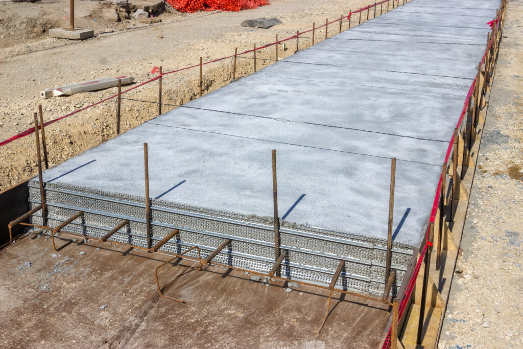 Ready mix concrete being poured for slabs and floors