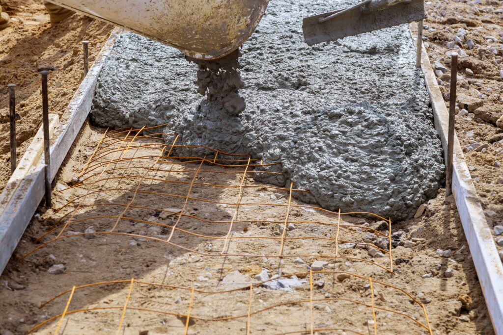 Ready mix concrete being poured for foundations and footings